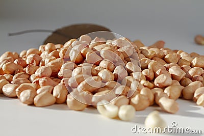 Raw peanut kernel on a white background Stock Photo