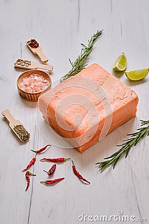 Raw pieces of salmon pressed in briquette Stock Photo