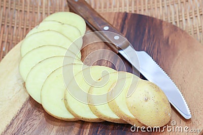 Raw potato slices. Stock Photo