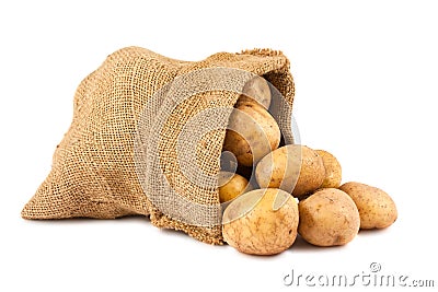 Raw potatoes in burlap sack Stock Photo