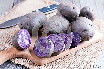 Raw purple potato Stock Photo