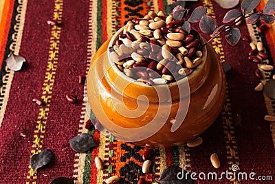 Raw red and white beans on a table in a pot Stock Photo