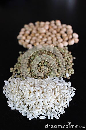 Raw rice, lentils and chickpeas Stock Photo