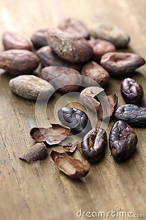 Raw and roasted cacao cocoa beans Stock Photo