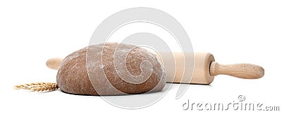 Raw rye dough, rolling pin and spikes Stock Photo