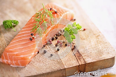 Raw salmon fillet ,raw fish, pepper and aromatic herb Stock Photo