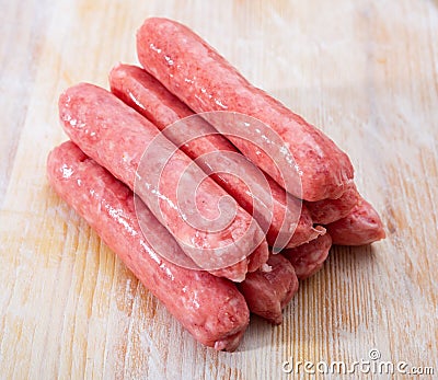 Raw sausages llonganissa Stock Photo