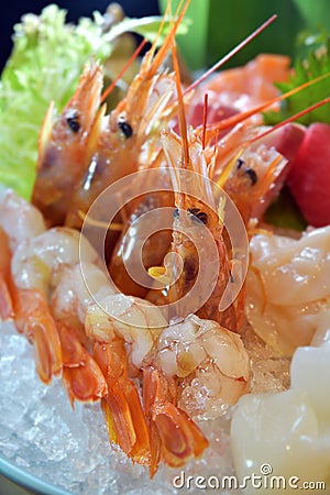 Raw shrimp sashimi Amaebi shell platter icecube Stock Photo