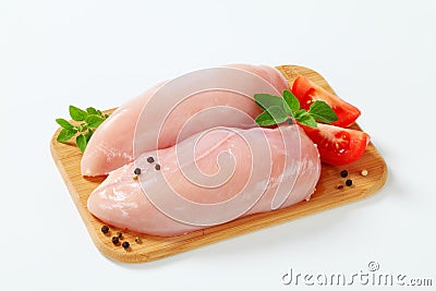 Raw skinless chicken breast fillets Stock Photo