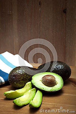 Raw sliced avocados Stock Photo