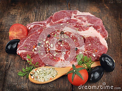 Raw steak with spice and tomatoes Stock Photo