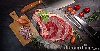 Raw T Bone steak entrecote prepared to Grill on turntable Stock Photo