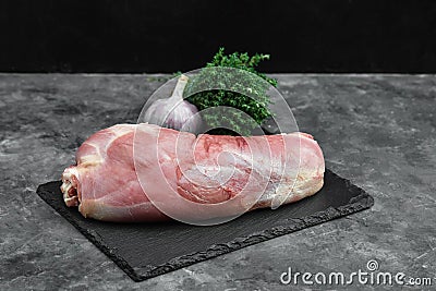 raw three beef steaks on a cutting board with spices on a stone background Stock Photo