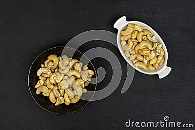 Raw unsalted cashew on grey stone Stock Photo