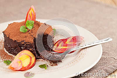 Raw vegan avocado chocolate mousse with nectarine Stock Photo