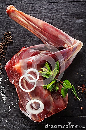 Raw Venison Haunch Seasoned with Herbs and Spices Stock Photo