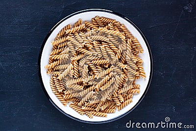 Raw wholewheat pasta Stock Photo