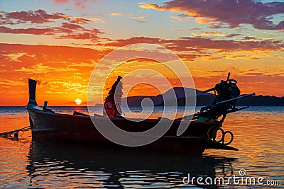 Rawai beach with andaman long tailed boat southern of thailand on clear sea water with sun shine in phuket Stock Photo