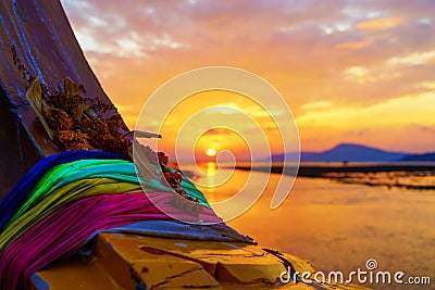 Rawai beach with andaman long tailed boat southern of thailand on clear sea water with sun shine in phuket Stock Photo