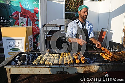 chef is preparing tikka kebab on the occasion of food festival Editorial Stock Photo