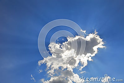 Beautiful ray of sun light shine through the cloud with silver lining Stock Photo