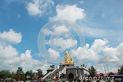 Take Photo beautiful buddish image call Luang Poo Tim and cloundy sky at Wat Lahan Rai. Editorial Stock Photo