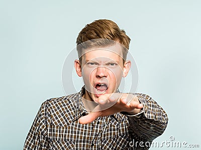Rays hatred frightening angry man reach out hand Stock Photo