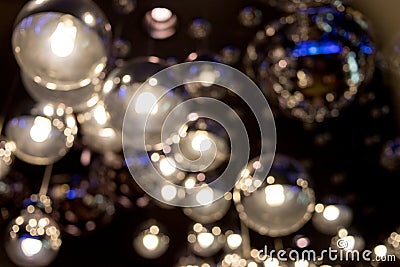 Rays and highlights of silver lamps, lampshade. Anstract background of Silver circles, decor, art. Defused shiny Stock Photo