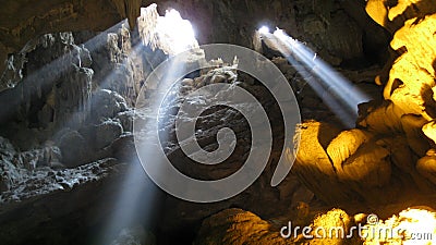 Rays of Light Entering a Cave Stock Photo