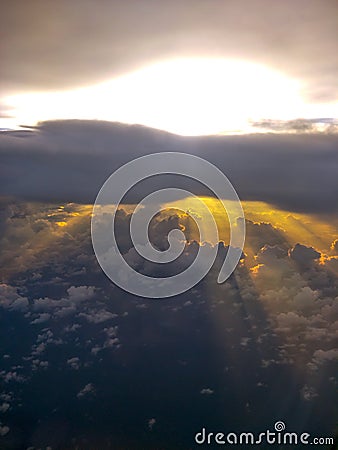 Rays of light shining through clouds Stock Photo