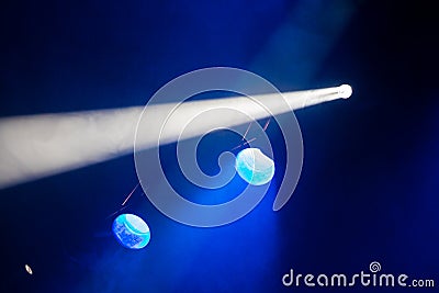 Rays theatrical spotlights on the stage during the performance. Lighting equipment. The lighting designer. Theatrical smoke Stock Photo