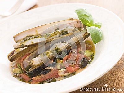 Razor Clams with Stewed Tomatoes Garlic and Olives Stock Photo