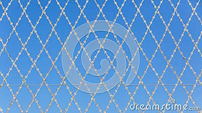 Razor Wire Security Fence Panoramic Blue Sky Stock Photo