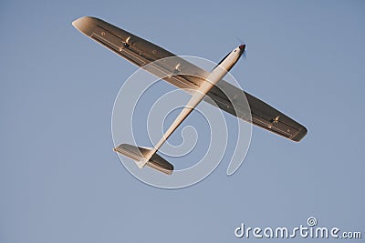 RC glider flying in the blue sky Stock Photo