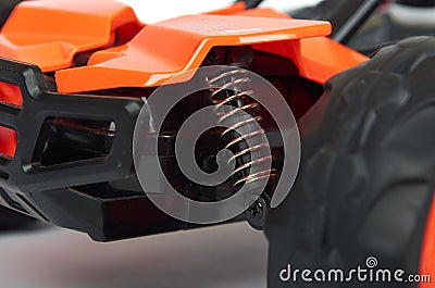 RC model rally, off road race buggy close up detail. Macro car shock absorbers Stock Photo