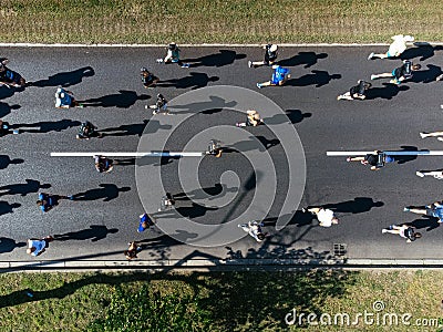 23rd of April 2023, Belgrade, Serbia. Shot of a group of young men running a marathon. Aerial drone photo. Editorial Stock Photo