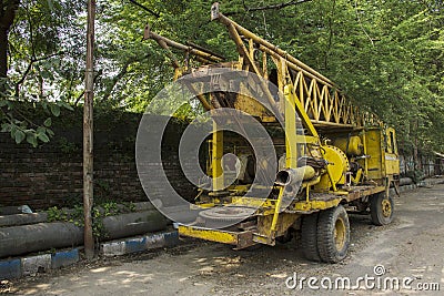 3rd November, 2021, Kolkata, West Bengal, India: A damaged scrap tree cutting car standing road side Editorial Stock Photo