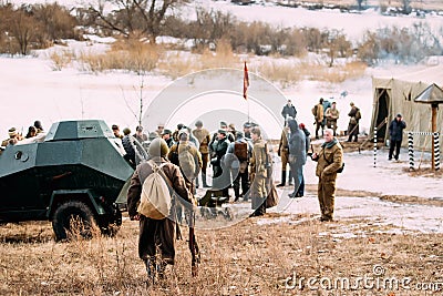 Re-enactor Dressed As Soviet Russian Red Army Infantry Soldier Of World War Ii Goes To Group Of Re-enactors Standing Editorial Stock Photo