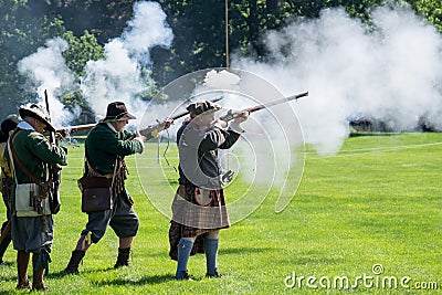 Re enactors shooting. Editorial Stock Photo