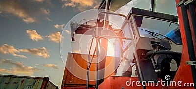 Reach stacker lifting container. Forklift truck handling container at dock. Reach stacker vehicle. Container transport in logistic Stock Photo