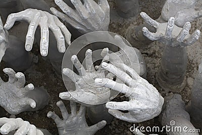 Chiang Rai, Thailand, Reaching Hands Sculpture at the White Temple Editorial Stock Photo