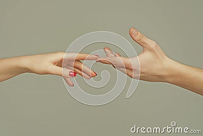 Reaching touching hands. Reach hand. Sensual touch fingers. Two hands trying to touch. Hands of man and woman reaching Stock Photo
