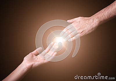 Reaching and touching hands. Stock Photo