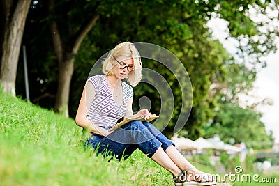 Read fairytale. woman in park reading book. reading is my hobby. Summer study. interesting story. Relax and get new Stock Photo