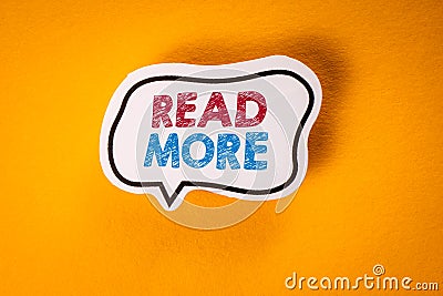 Read More. Speech bubble with text on a yellow background Stock Photo