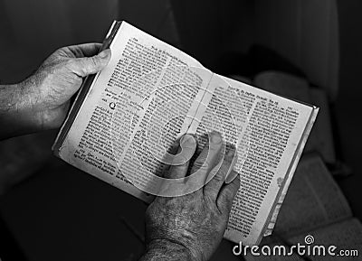 Readding a book white and black Stock Photo