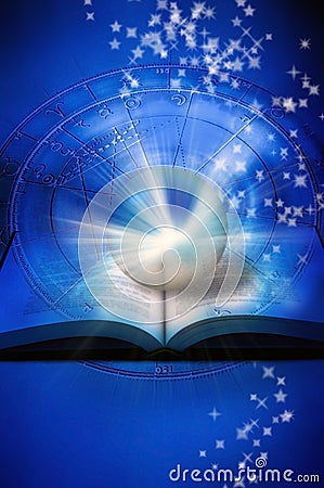 Reading astrology Stock Photo