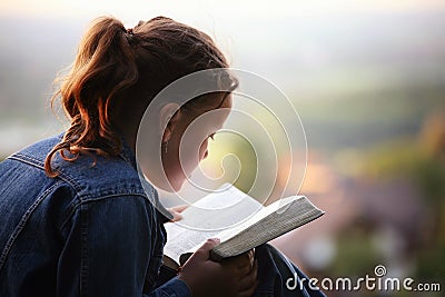 Reading the bible Stock Photo