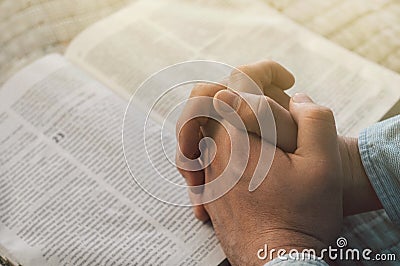 Reading the bible. Prayer. Hands folded in prayer concept. The concept of faith Stock Photo