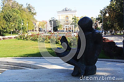 A Reading boy monument in Astrakhan Editorial Stock Photo